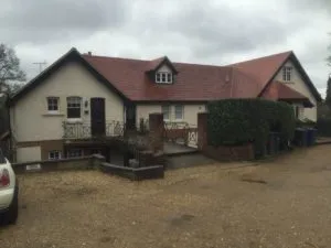 a car is parked in front of a house