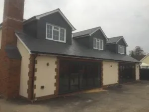 a house with a car parked in front of it