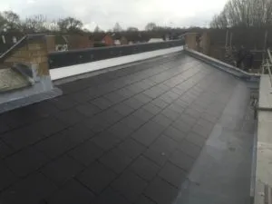 a view of a roof from the top of a building